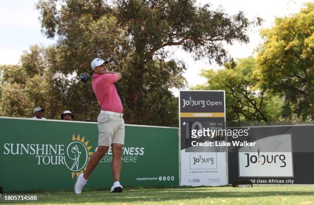 Christiaan Bezuidenhout of South Africa plays a tee shot prior to the Joburg Open at Houghton GC on November 21, 2023 in Johannesburg, South Africa.