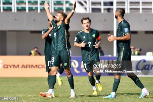 Rahis Nabi from Pakistan celebrates a goal in front of crowd during the 2026 FIFA World Cup AFC Qualifier Group G match between Pakistan and...