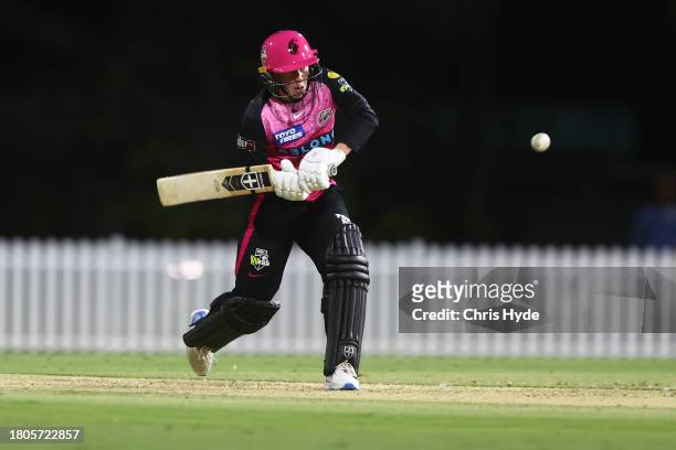 Mathilda Carmichael of the Sixers bats during the WBBL match between Brisbane Heat and Sydney Sixers at Allan Border Field, on November 21 in...