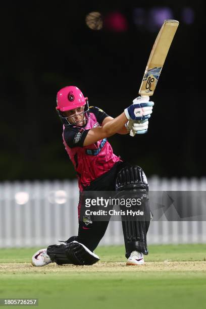 Maitlan Brown of the Sixers bats during the WBBL match between Brisbane Heat and Sydney Sixers at Allan Border Field, on November 21 in Brisbane,...