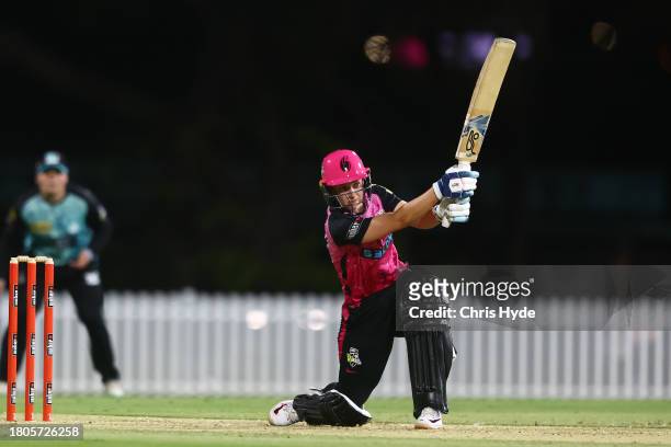 Maitlan Brown of the Sixers bats during the WBBL match between Brisbane Heat and Sydney Sixers at Allan Border Field, on November 21 in Brisbane,...