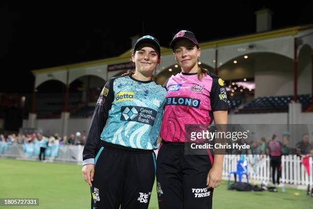 Sisters Amelia Kerr of the Heat and Jess Kerr pose after the WBBL match between Brisbane Heat and Sydney Sixers at Allan Border Field, on November 21...