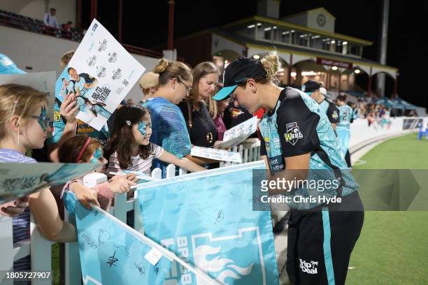 Nicola Hancock with Heat fans during the WBBL match between Brisbane Heat and Sydney Sixers at Allan Border Field, on November 21 in Brisbane,...