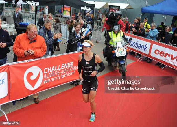 Susan Blatt of Germany winning the women's race during the Challenge Triathlon Almere-Amsterdam on September 14, 2013 in Almere, Netherlands.