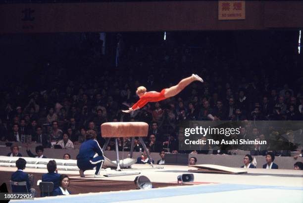 Larysa Latynina of Soviet Union competes in the Horse Vault of the Women's Artistic Gymnastics Individual All-Around during the Tokyo Olympics at...
