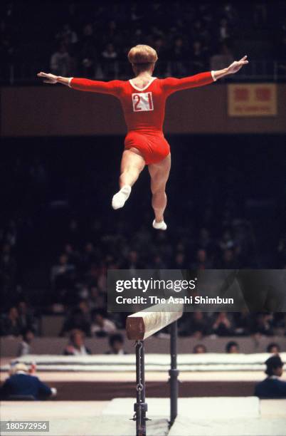 Larysa Latynina of Soviet Union competes in the Balance Beam of the Women's Artistic Gymnastics Individual All-Around during the Tokyo Olympics at...