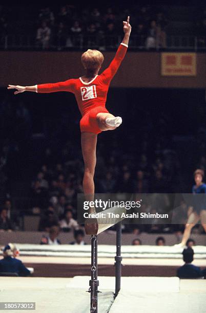 Larysa Latynina of Soviet Union competes in the Balance Beam of the Women's Artistic Gymnastics Individual All-Around during the Tokyo Olympics at...