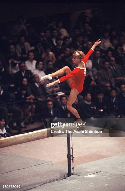 Larysa Latynina of Soviet Union competes in the Balance Beam of the Women's Artistic Gymnastics Individual All-Around during the Tokyo Olympics at...