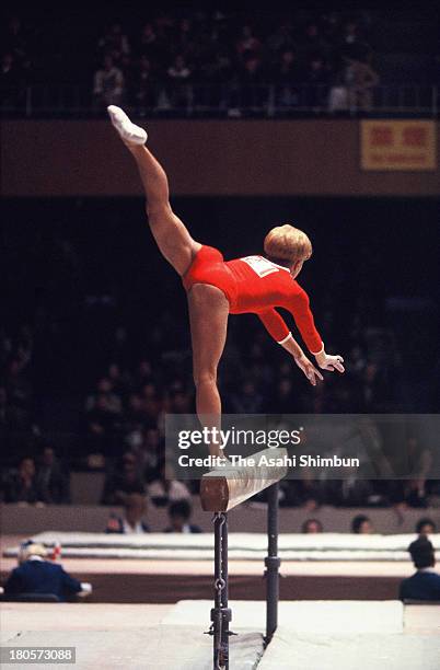 Larysa Latynina of Soviet Union competes in the Balance Beam of the Women's Artistic Gymnastics Individual All-Around during the Tokyo Olympics at...