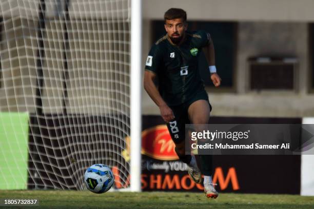 Rahis Nabi runs with the ball in 2nd half during the 2026 FIFA World Cup AFC Qualifier Group G match between Pakistan and Tajikistan at Jinnah Sports...