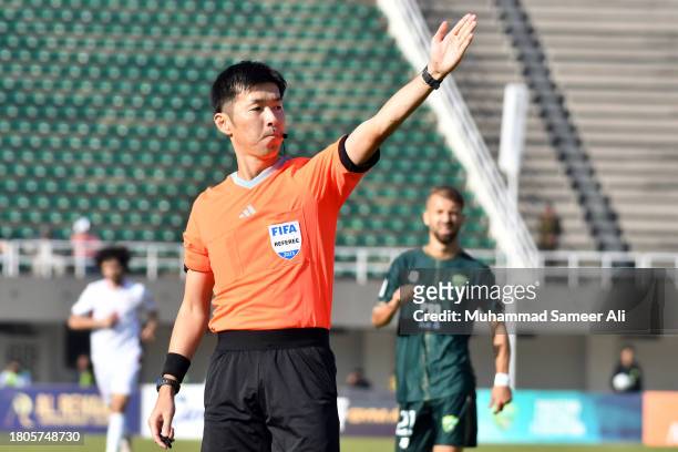 The Referee gives offside during 1st half of the 2026 FIFA World Cup AFC Qualifier Group G match between Pakistan and Tajikistan at Jinnah Sports...