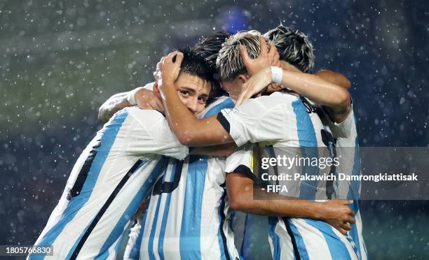 Players of Argentina celebrate after Luis Balbo of Venezuela scores an own goal to make it the first goal for Argentina during the FIFA U-17 World...