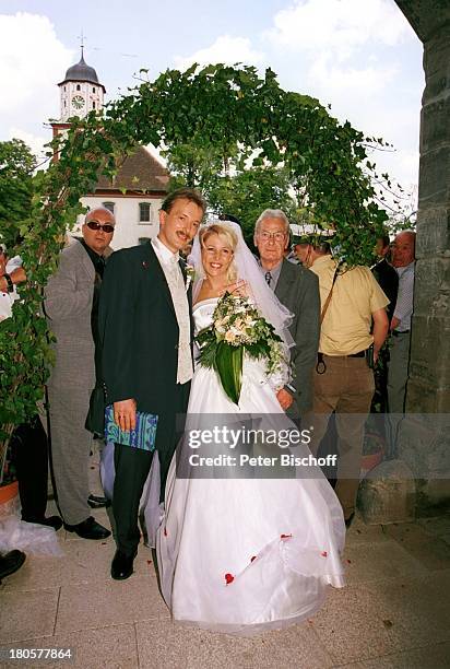 Alexandra Hofmann, Ehemann Dietmar Geiger, Hochzeit von Alexandra Hofmann , Kirche St.Martin/Meßkirch/Baden-Württemberg, Blumen, Blumenstrauß,...