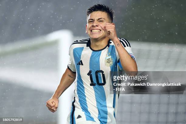 Claudio Echeverri of Argentina celebrates after scoring the team's third goal during the FIFA U-17 World Cup Round of 16 match between Argentina and...
