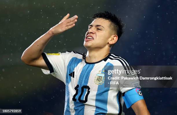 Claudio Echeverri of Argentina celebrates after scoring the team's third goal during the FIFA U-17 World Cup Round of 16 match between Argentina and...