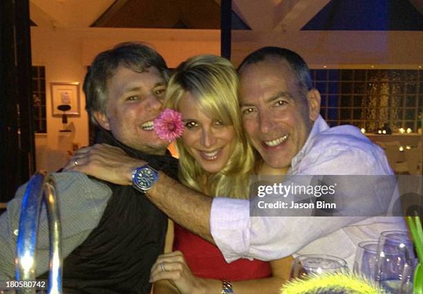 DuJour Media Founder Jason Binn, Alison Brod of Alison Brod PR and realtor Steven Croman pose circa August 2013 in New York City.