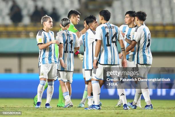 Players of Argentina interact at the half-time whistle during the FIFA U-17 World Cup Round of 16 match between Argentina and Venezuela at Si Jalak...