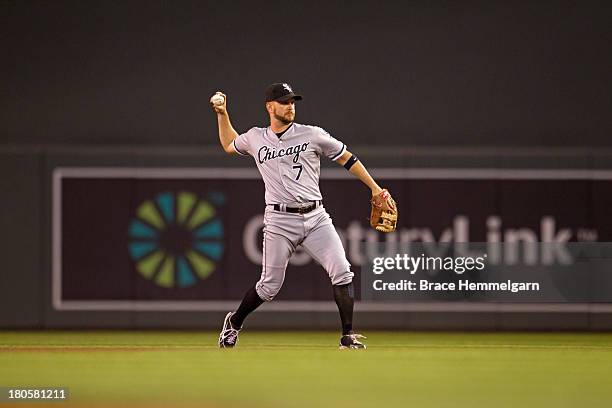 Jeff Keppinger of the Chicago White Sox throws against the Minnesota Twins on August 16, 2013 at Target Field in Minneapolis, Minnesota. The White...