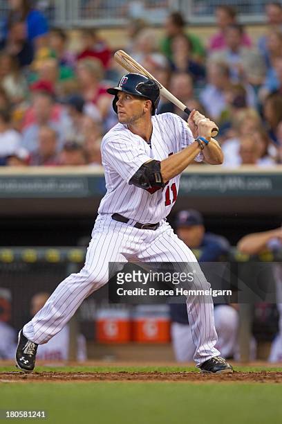 Clete Thomas of the Minnesota Twins bats against the Chicago White Sox on August 16, 2013 at Target Field in Minneapolis, Minnesota. The White Sox...