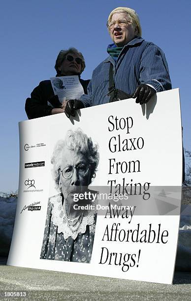 Elaine Mahan from Andora, Pennsylvania and Jeanne Boone of Philadelphia protest outside of GlaxoSmithKline's headquarters February 20, 2003 in...