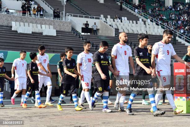Team Tajikistan walks towards the pitch for the national anthems during the 2026 FIFA World Cup AFC Qualifier Group G match between Pakistan and...