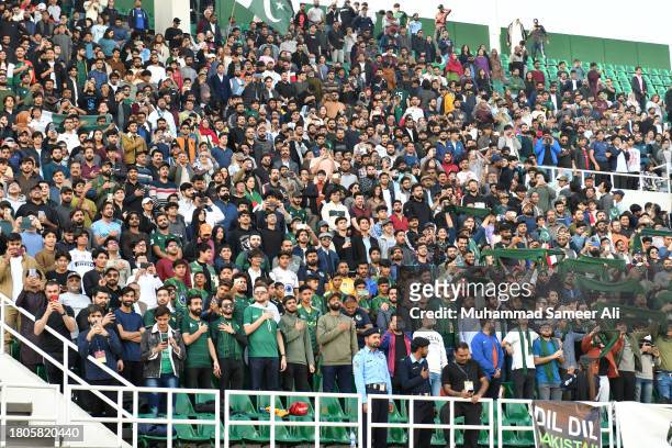 The crowd sings the national anthem of Pakistan before the 2026 FIFA World Cup AFC Qualifier Group G match between Pakistan and Tajikistan at Jinnah...