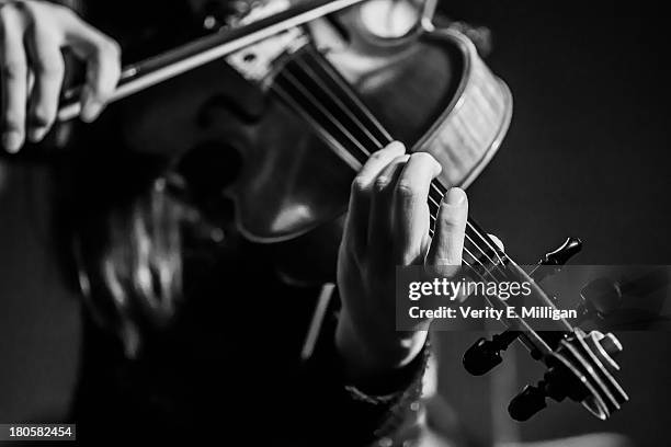 close up of women playing a violin - violin ストックフォトと画像