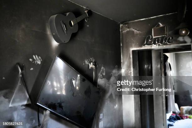 Smoke damage clings to the walls of a home after the October 7th Hamas attacks at Kibbutz Kfar Aza close the Gaza border on November 21, 2023 in Kfar...