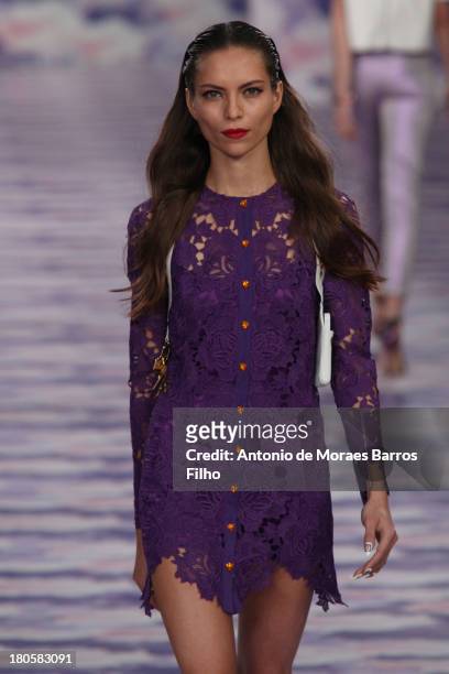 Model walks the runway at the House of Holland show during London Fashion Week SS14 on September 14, 2013 in London, England.