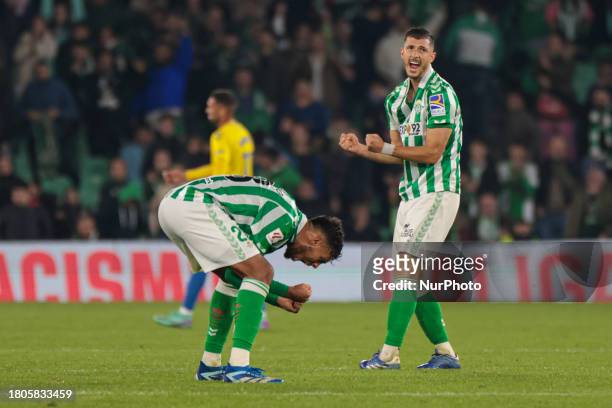 Chadi Riad and Guido Rodriguez of Real Betis are celebrating their win in the La Liga EA Sports match against UD Las Palmas at Benito Villamarin in...