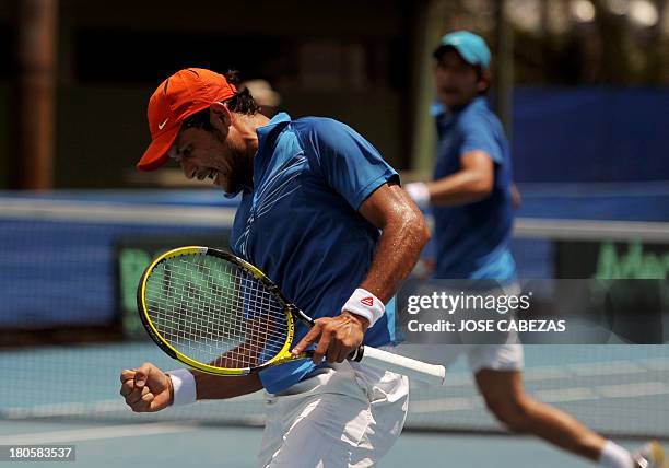 El Salvador's tennis player Rafael Arevalo reacts during their Davis Cup doubles match against Venezuela's Luis Martinez and Roberto Maytin, on...