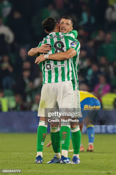 Guido Rodriguez and Chadi Riad of Real Betis are celebrating their win in the La Liga EA Sports match against UD Las Palmas at Benito Villamarin in...