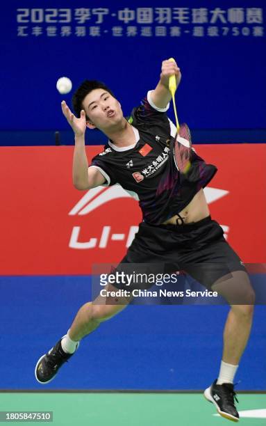 Weng Hongyang of China competes in the Men's Singles first round match against Anders Antonsen of Denmark on day one of the China Badminton Masters...