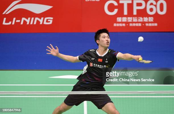 Weng Hongyang of China competes in the Men's Singles first round match against Anders Antonsen of Denmark on day one of the China Badminton Masters...