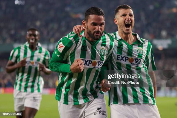 William Jose of Real Betis is celebrating with his teammates after scoring his team's first goal during the La Liga EA Sports match between Real...