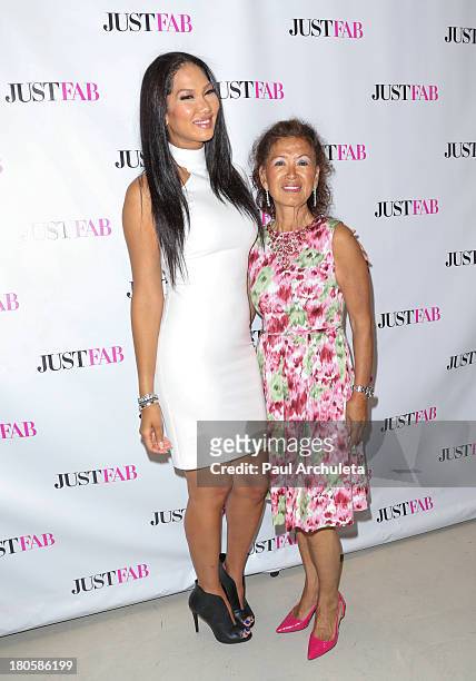 Fashion Designer / TV Personality Kimora Lee Simmons and her Mother Joanne Kyoko Perkins attends the JustFab boutique flagship store grand opening at...