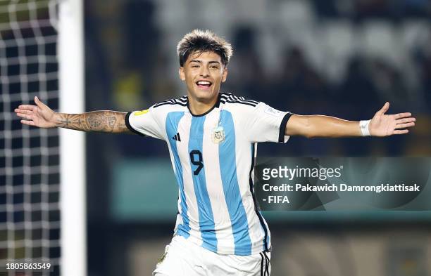 Agustin Ruberto of Argentina celebrates after scoring the team's fourth goal from the penalty spot during the FIFA U-17 World Cup Round of 16 match...