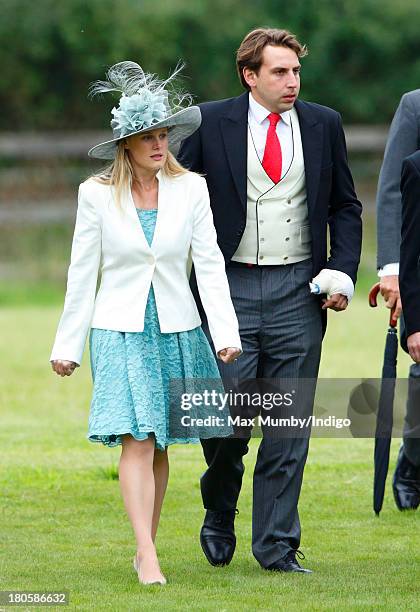 Emily Hutt and James Hutt attend the wedding of James Meade and Lady Laura Marsham at the Parish Church of St. Nicholas in Gayton on September 14,...