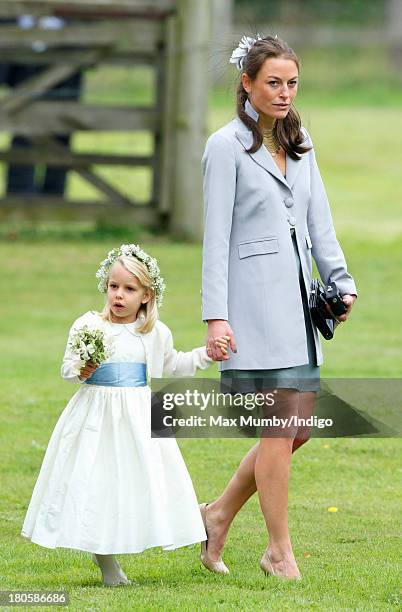 Jecca Craig attends the wedding of James Meade and Lady Laura Marsham at the Parish Church of St. Nicholas in Gayton on September 14, 2013 near...