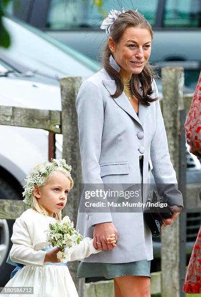 Jecca Craig attends the wedding of James Meade and Lady Laura Marsham at the Parish Church of St. Nicholas in Gayton on September 14, 2013 near...