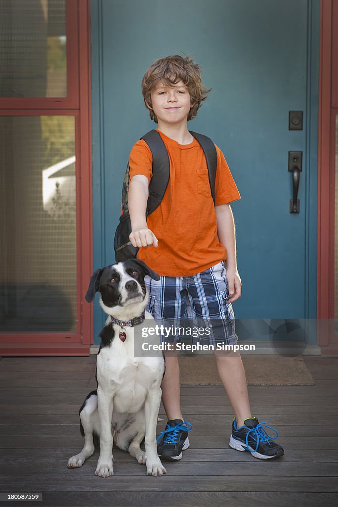 A boy and his dog, going to school