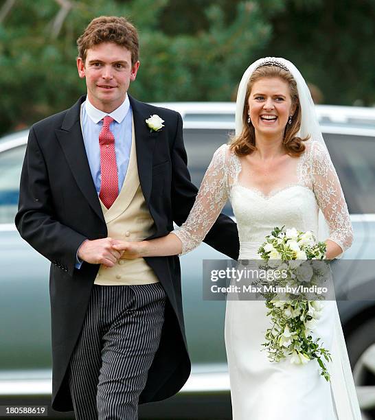 James Meade and Lady Laura Marsham leave the Parish Church of St. Nicholas in Gayton after their wedding on September 14, 2013 near King's Lynn,...