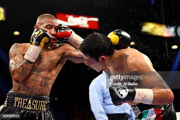 Pablo Cesar Cano throws a right to the head of Ashley Theophane during their welterweight fight at the MGM Grand Garden Arena on September 14, 2013...