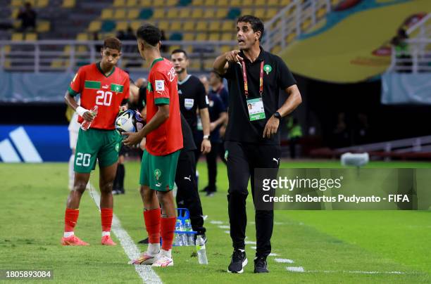 Said Chiba, Head Coach of Morocco, gestures during the FIFA U-17 World Cup Round of 16 match between Morocco and IR Iran at Gelora Bung Tomo Stadium...