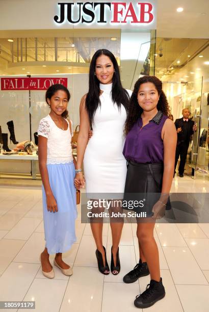 Aoki Lee Simmons, Kimora Lee Simmons and Ming Lee Simmons attend JustFab.com Los Angeles flagship store debut at Glendale Galleria on September 14,...