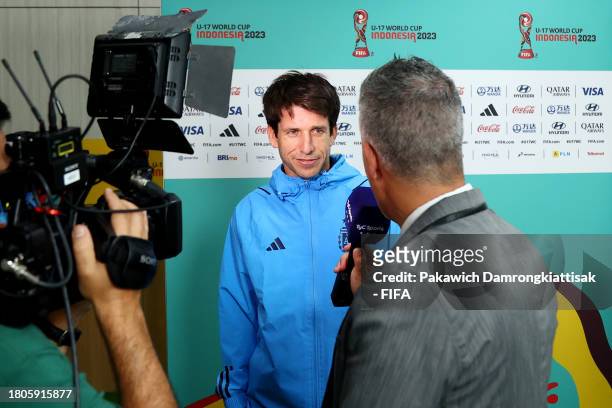 Diego Placente, Head Coach of Argentina, is interviewed in the mixed zone after the FIFA U-17 World Cup Round of 16 match between Argentina and...
