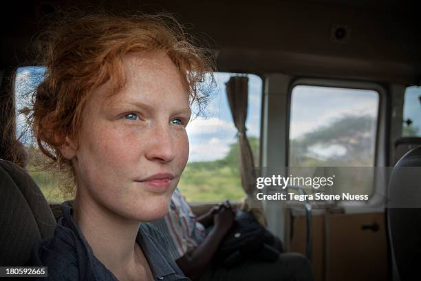 a woman traveling in africa. - 2013newwomen stock pictures, royalty-free photos & images