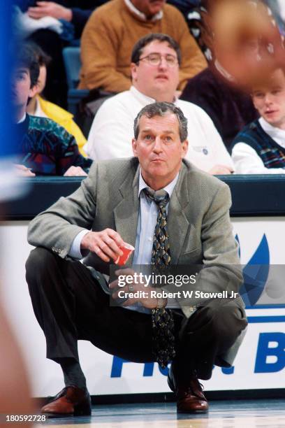 UConn's men's basketball coach Jim Calhoun works the sidelines, Hartford, Connecticut, 1994.