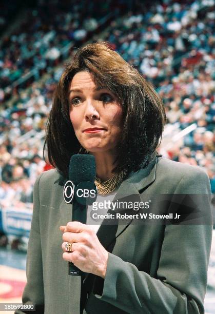 Sports' Leslie Visser reports from the sidelines of a University of Connecticut basketball game, Hartford, Connecticut, 1990.