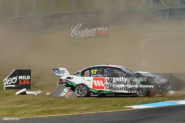 Ash Walsh crashes in his Dick Johnson Racing Ford during the Sandown 500 race 28, which is round 10 of the V8 Supercar Championship Series at Sandown...